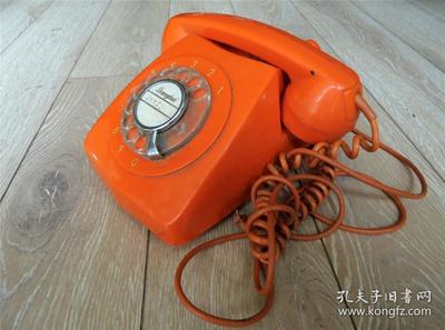 指尖上的岁月回声 从70年代上海电讯器材厂橙色拨盘电话机说起